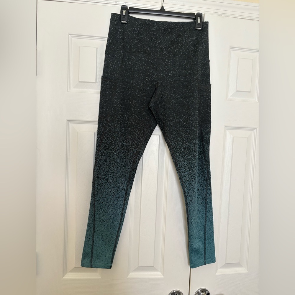 Used black with gradient teal leggings size large.